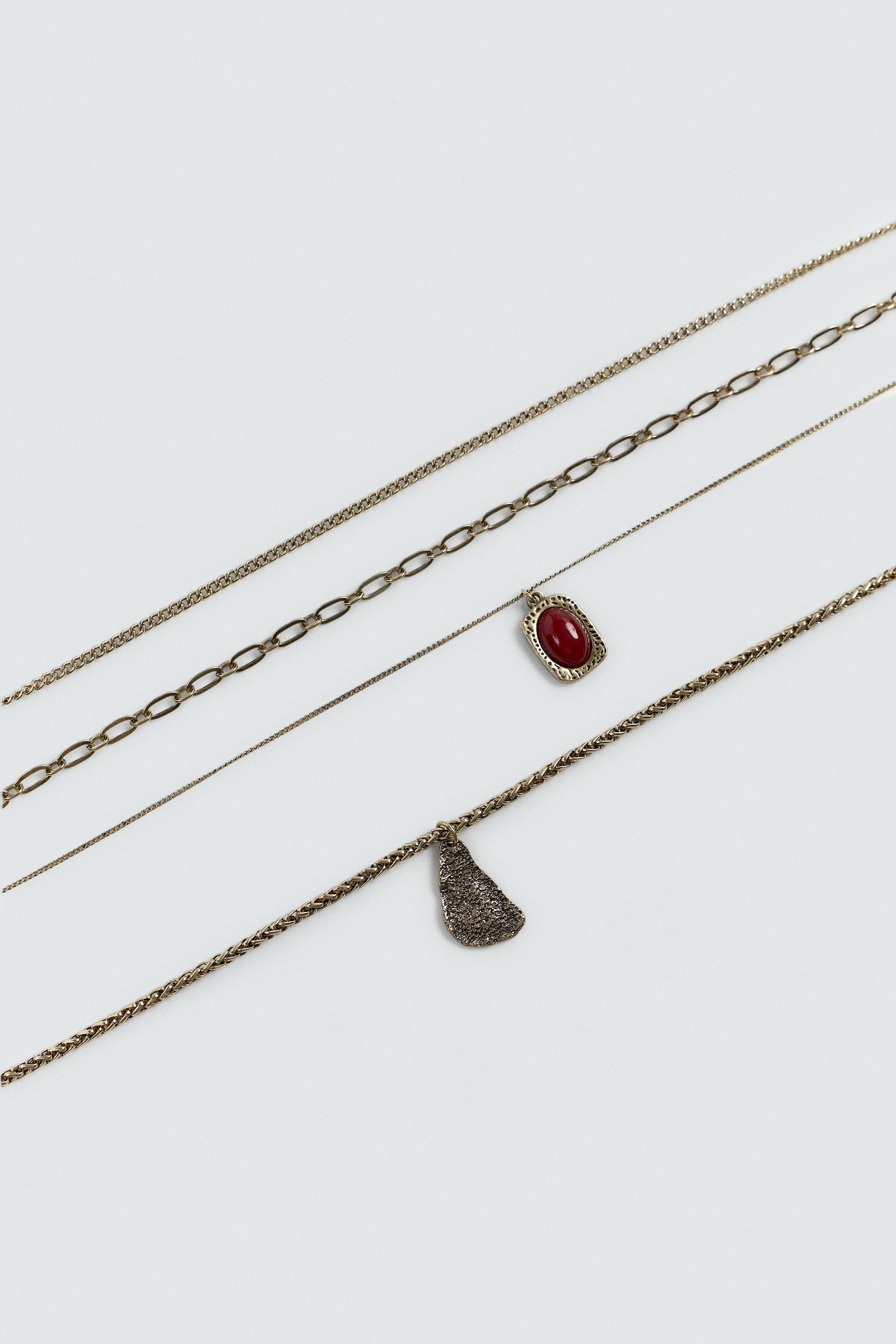 LOT DE 4 COLLIERS ASSORTIS